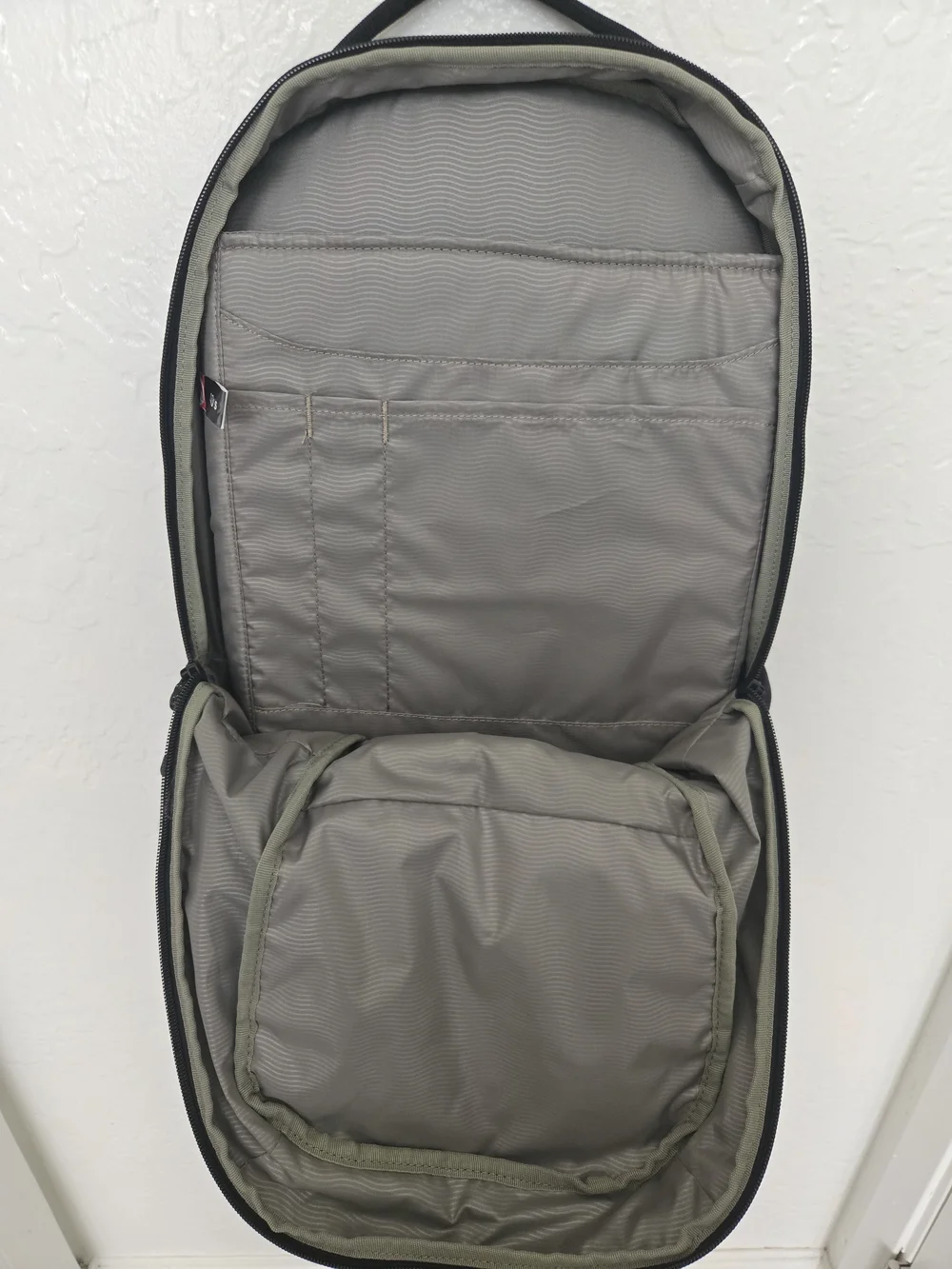 Thule Black Backpack with Innoviva Specialty Therapeutics Logo